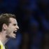 Britain's Murray reacts after losing a point to Serbia's Djokovic during their men's singles tennis match at the ATP World Tour Finals in London