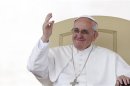 Pope Francis waves during his Wednesday general audience in Saint Peter's Square at the Vatican