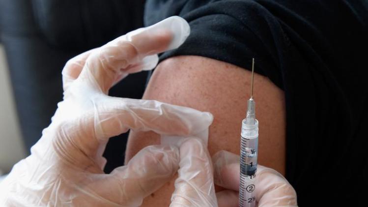 People receive a free meningitis vaccine in April 2013 in Hollywood, California