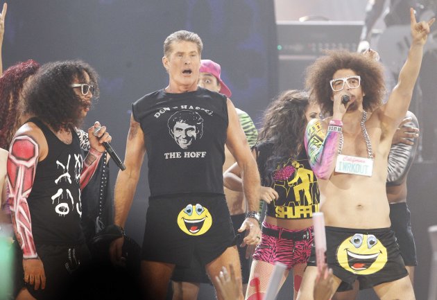 Actor David Hasselhoff performs with SkyBlu and DJ Redfoo of pop group LMFAO at the 2011 American Music Awards in Los Angeles