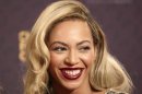 Singer Beyonce poses for photographs at "The Sound of Change" concert at Twickenham Stadium in London