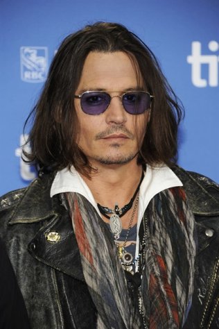 FILE - In this Sept. 8, 2012 file photo, actor Johnny Depp participates in a photo call and press conference for the film "West of Memphis" at TIFF Bell Lightbox during the Toronto International Film Festival, in Toronto. HarperCollins Publishers announced Monday, Oct. 15, 2012, that Depp will help run an imprint that will be a home for “authentic, outspoken and visionary” books. (Photo by Evan Agostini/Invision/AP, File)