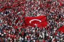 Supporters of various political parties gather in Istanbul's Taksim Square