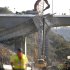 Workers continue the demolition of the center span of the Mulholland Drive bridge along Interstate 405 in Los Angeles on Saturday Sept. 29,2012. Construction crews are on schedule and traffic tie-ups are minimal in Los Angeles, making for a smooth start to Carmageddon II, the sequel to last year's shutdown of one of the nation's busiest freeways. (AP Photo/Richard Vogel)