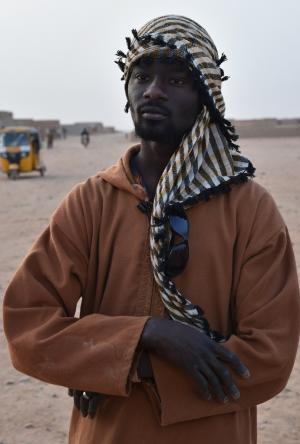 Ali Idrissu, 23, from Ghana, stands in Agadez, northern&nbsp;&hellip;