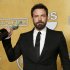 Ben Affleck holds the award for outstanding performance by a cast in a motion picture for "Argo" at the 19th annual Screen Actors Guild Awards in Los Angeles