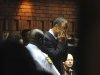 Athlete Oscar Pistorius weeps in court in Pretoria, South Africa, Friday, Feb 15, 2013, at his bail hearing in the murder case of his girlfriend Reeva Steenkamp.   Oscar Pistorius arrived at a courthouse Friday, for his bail hearing in the murder case of his girlfriend as South Africans braced themselves for the latest development in a story that has stunned the country. The Paralympic superstar was earlier seen leaving a police station in a dark suit with a charcoal gray jacket covering his head as he got into a police vehicle. Model Reeva Steenkamp was shot and killed at Pistorius' upmarket home in an eastern suburb of the South African capital in the predawn hours of Thursday. (AP Photo/Antione de Ras - Independent Newspapers Ltd South Africa) SOUTH AFRICA OUT