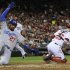 Los Angeles Dodgers' Kemp scores on single by Ramirez as Washington Nationals' Flores takes throw to plate during their MLB National League baseball doubleheader in Washington