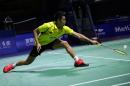 Lin Dan of China hits a return during the men's singles second round match at the China Open badminton tournament in Fuzhou, east China's Fujian province on November 12, 2015