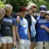Brunswick High School students console each other at a crash site Monday, June 4, 2012, near Brunswick, Ohio. An 18-year-old boy died Monday, a day after he was thrown from a car just hours before his high school graduation in a northeast Ohio crash that killed three other teens. A car carrying Fox and four other teenagers went airborne, crashed, and flipped onto its roof at a railroad crossing early Sunday. (AP Photo/Tony Dejak)