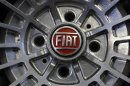 Fiat logo is seen on the wheel of a Fiat car in Turin
