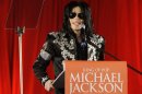 FILE - In this March 5, 2009 file photo, US singer Michael Jackson announces that he is set to play ten live concerts at the London O2 Arena in July, which he announced at a press conference at the London O2 Arena. Los Angeles jurors hearing Katherine Jackson's lawsuit against AEG Live saw detailed contracts the company drafted for her son and his personal physician, as well as budgets and an email chain in which two of the company's attorneys exchanged messages in which the singer was called 