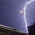 File photo of lightning over headquarters of Swiss banks UBS and Credit Suisse during a thunderstorm in Zurich