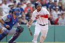 Boston Red Sox's Shane Victorino grounds into a fielding error to drive in the walk-off run in the ninth inning against the Toronto Blue Jays during their MLB American League East baseball game in Boston