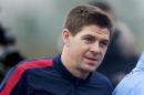 England football team player Steven Gerrard arrives for an England training session at Arsenal's training ground, London Colney, north of London on November 18, 2013