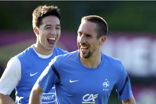 France's soccer players Nasri and Ribery attend a training session at the team's training center in Kircha near Donetsk during the Euro 2012