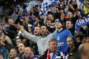 Birmingham City's supporters celebrate at the Wembley Stadium in London on February 27, 2011