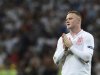 England's Rooney gestures during Euro 2012 soccer match against Ukraine in Donetsk