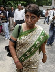 Maya Kodnani, a state assembly lawmaker and former Gujarat state minister, arrives for a court hearing in the western Indian city of Ahmedabad August 29, 2012. REUTERS/Amit Dave