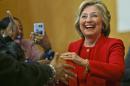 Democratic presidential candidate Hillary Clinton is greeted by supporters Wednesday, April 13, 2016, in the Bronx borough of New York. (AP Photo/Frank Franklin II)