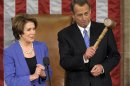 House Minority Leader Nancy Pelosi of Calif. applauds after handing the gavel to House Speaker John Boehner of Ohio who was re-elected as House Speaker of the 113th Congress, Thursday, Jan. 3, 2013, on Capitol Hill in Washington. (AP Photo/Susan Walsh)