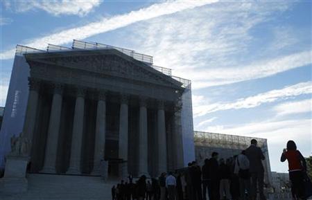 People line up for admission at the U.S. Supreme Court in Washington October 1, 2012. REUTERS/Gary Cameron