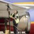 FILE - In this April 23, 2008 file photo, an aviation ground crew member pumps fuel into a Southwest Airlines' plane at Los Angeles International Airport in Los Angeles. Why is it so hard to make money in the airline business? Airlines buy multi-million-dollar jets and then don’t just have to factor in the flow of business travelers but the whims of vacationers, the price of fuel and the weather. (AP Photo/Ric Francis, File)