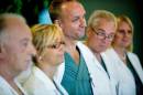 In this Tuesday, Sept. 18, 2012 file photo, from left specialist surgeons Andreas G Tzakis, Pernilla Dahm-Kähler, Mats Brannstrom, Michael Olausson and Liza Johannesson attend a news conference, at Sahlgrenska hospital in Goteborg, Sweden. In a world first, a baby has been born to a Swedish woman who received a transplanted womb last year, according to the doctor who performed the pioneering procedure. Earlier this year, Dr. Mats Brannstrom, a professor of obstetrics and gynecology at the University of Goteburg and Stockholm IVF, began transferring embryos into seven women in Sweden who successfully received new wombs. Brannstrom told The Associated Press the baby was born in September, 2014 to a 36-year-old woman who received her womb from a close family friend. Neither the woman nor her male partner was identified. (AP Photo/Adam Ihse, File) SWEDEN OUT