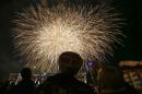People watch fireworks during celebrations on the main square of�the Crimean city of�Simferopol