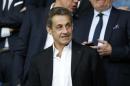 France's former president Nicolas Sarkozy attends the French Ligue 1 soccer match between Paris St Germain and Reims at the Parc des Princes stadium in Paris