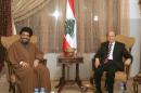 Hezbollah secretary general Hassan Nassrallah (L), seen here in his first meeting with Lebanese politician Michel Aoun in 2006, said he will back the Christian legislator for president