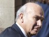 Britain's Business Secretary Vince Cable arrives to appear in front of the Leveson Inquiry into media practice at the Hight Court in London