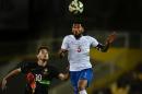 Portugal's midfielder Pizzi (L) vies with Cape Verde's midfielder Babanco during the EURO 2016 friendly football match in Estoril outside Lisbon on March 31, 2015