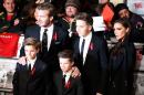 David and Victoria Beckham with their children Brooklyn, back row centre, Romeo. front left, and Cruz at the world premiere of The Class of 92 at London's Odeon Leicester Square