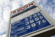 FILE - This Feb. 27, 2012 file photo shows gas prices at a Pittsburgh Exxon mini-mart. Exxon Mobil Corp. reports quarterly financial results before the market open on Thursday, Aug. 1, 2013. (AP Photo/Gene J. Puskar, File)