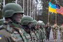 US and Ukrainian soldiers attend an opening ceremony of the joint Ukrainian-US military exercise 'Fearless Guardian' at the Yavoriv training ground in the western region of Lviv on April 20, 2015