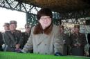 KCNA picture shows North Korean leader Kim Jong Un watching landing and anti-landing exercises being carried out by the Korean People's Army at an unknown location