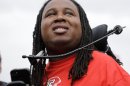Former Rutgers football player Eric LeGrand looks up at the stands during ceremony where his jersey No. 52 was retired at halftime of an NCAA college football game against Eastern Michigan in Piscataway,N.J., Saturday, Sept. 14, 2013. LeGrand was paralyzed while making a tackle in an October 2010 game. (AP Photo/Mel Evans)