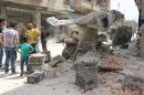 A reported air strike by governement forces hit the rebel-held neighbourhood of Sakhur in Aleppo on April 24, 2016 on a third day of renewed deadly violence in the battered city