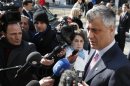 Kosovo's Prime Minister Thaci talks to the media as he arrives for a meeting with Serbian Prime Minister Dacic and Ashton in Brussels