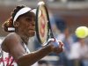 Williams of the U.S. hits a return to compatriot Mattek-Sands during their women's singles match at the U.S. Open tennis tournament in New York