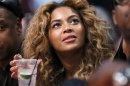 Beyonce sits courtside at the NBA All-Star basketball game in Houston
