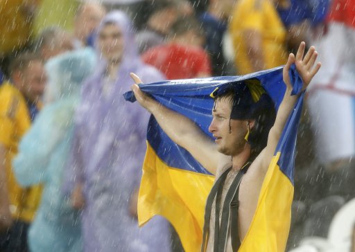 Fan of Ukraine reacts as their Group D Euro 2012 soccer match against France was suspended at Donbass Arena in Donets