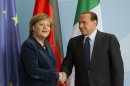 FILE- This is a Wednesday, Jan. 12, 2011 file photo of German Chancellor Angela Merkel, left, and Italian Prime Minister Silvio Berlusconi, right, as they shake hands after a news conference at the chancellery in Berlin, Germany. Often these days, the first order of business at European Union summits is not the continent's dreadful financial crisis. It's getting to know the people around the table. The group of national leaders that will meet this week in Brussels is a different crew from the one that met in October 2009, when the crisis in Europe first erupted with the news that Greece was in deep difficulty. (AP Photo/Gero Breloer, File)