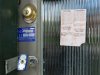 File photo of a padlock and foreclosure papers attached to the front door of a home in the Price Hill neighborhood of Cincinnati