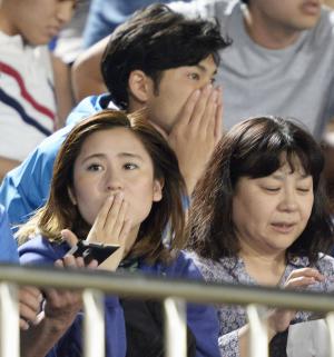 Japanese soccer fans react to a strong earthquake as &hellip;