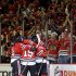 Chicago Blackhawks celebrate after right wing Patrick Kane scored a goal during the third period in Game 5 of the NHL hockey Stanley Cup playoffs Western Conference finals against the Los Angeles Kings, Saturday, June 8, 2013, in Chicago. (AP Photo/Nam Y. Huh)