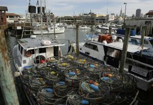 A boat sits loaded with crab pots waiting to go out&nbsp;&hellip;