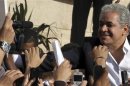 Egypt's former presidential candidate Sabahy greets supporters during a commemoration of the second anniversary of the death of Khaled Said in Alexandria