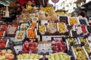 Fruits are displayed for sale at Al-Shaalan market a day before the fasting month of Ramadan in Damascus